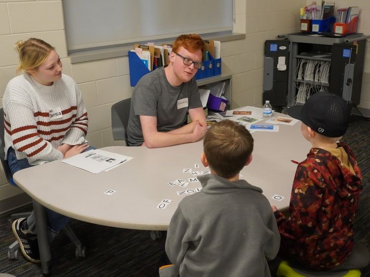 Future educators bring literacy event to life at Zinser Elementary